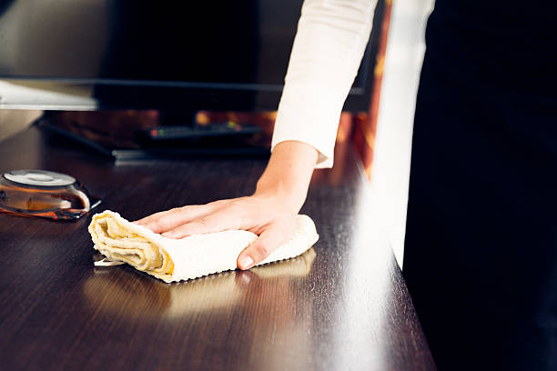 istock maid making a hotel room 188117181