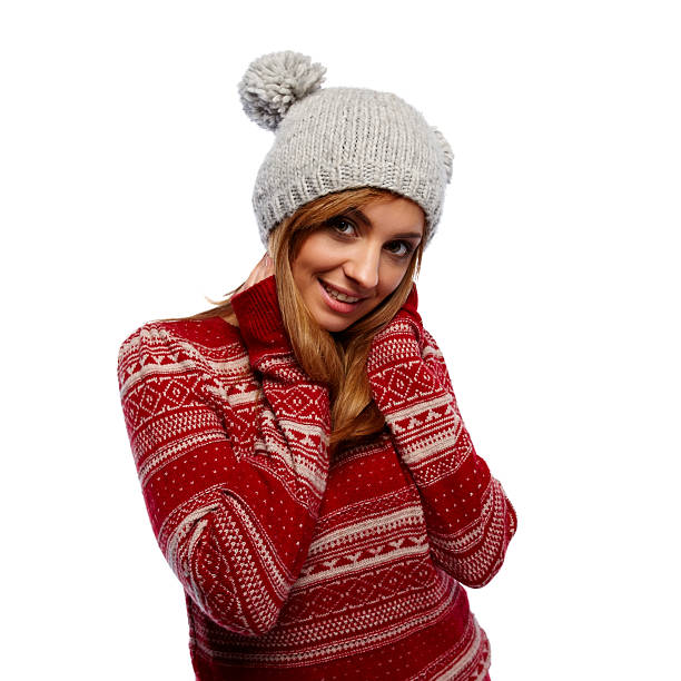 istock Beautiful female in red sweater and cap 188117744
