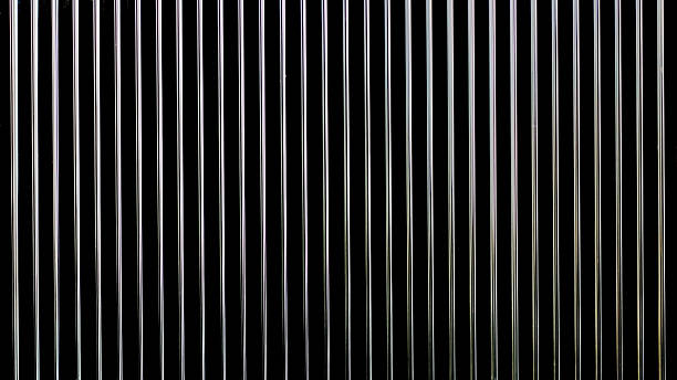 metal wire grill background close up of a metal grill on a black background metal grate photos stock pictures, royalty-free photos & images