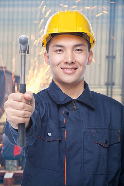 istock Portrait of Construction Worker with Hammer 188123187