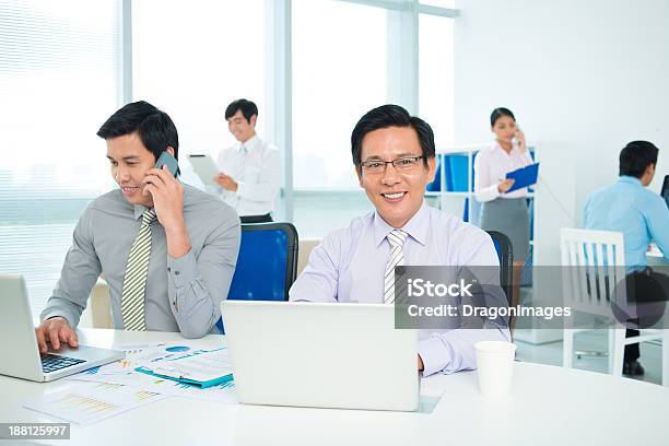 At Work Stock Photo - Download Image Now - Adult, Adults Only, Asian and Indian Ethnicities