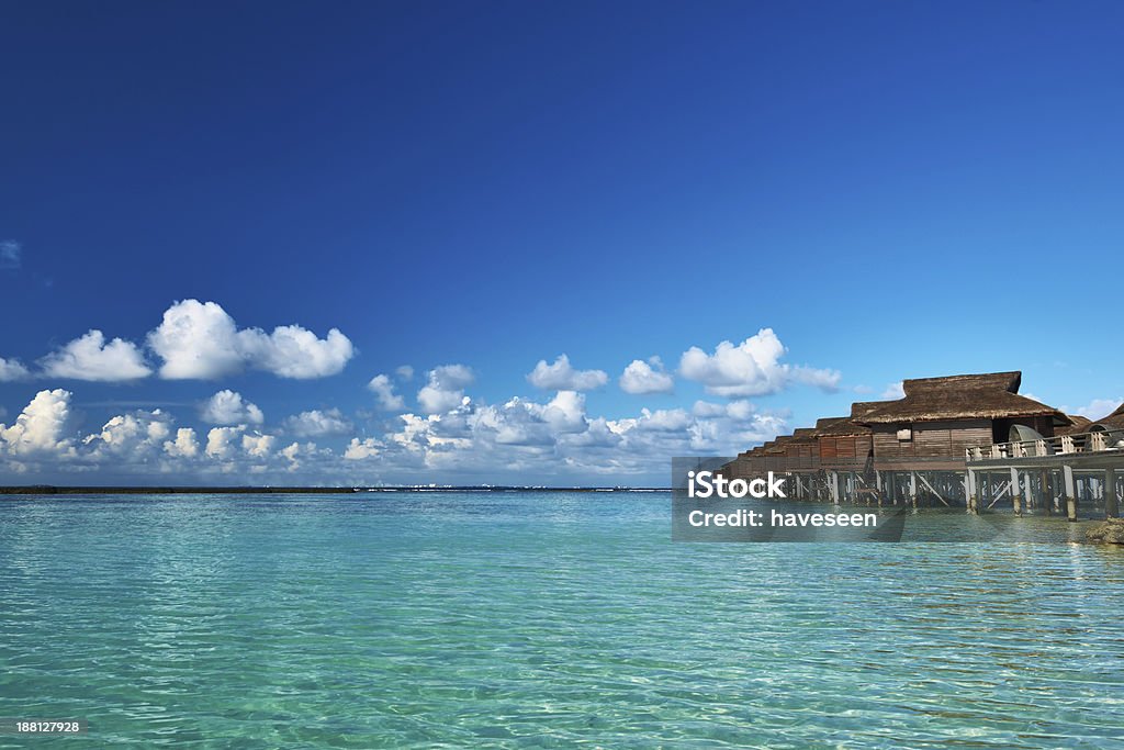 Beautiful beach with water bungalows Beautiful beach with water bungalows at Maldives Beach Stock Photo