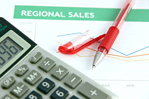 istock Pen and calculator on business graph. 188128311