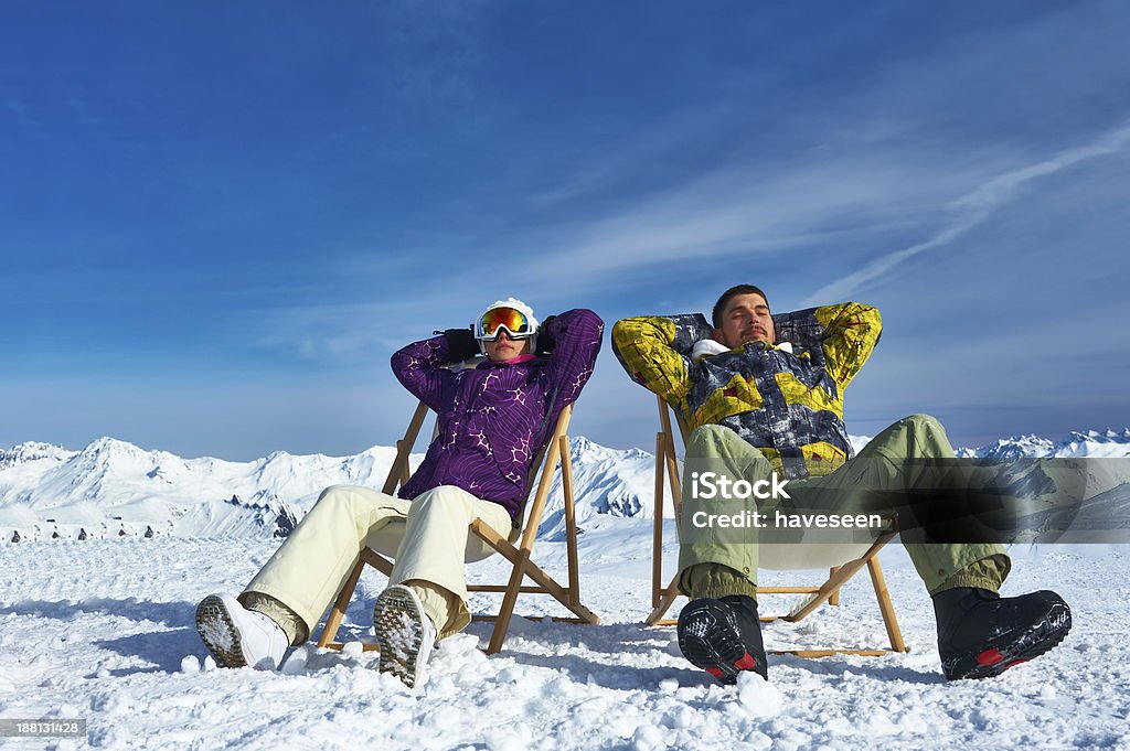 Apres ski at mountains Couple at mountains in winter, Meribel, Alps, France Courchevel Stock Photo