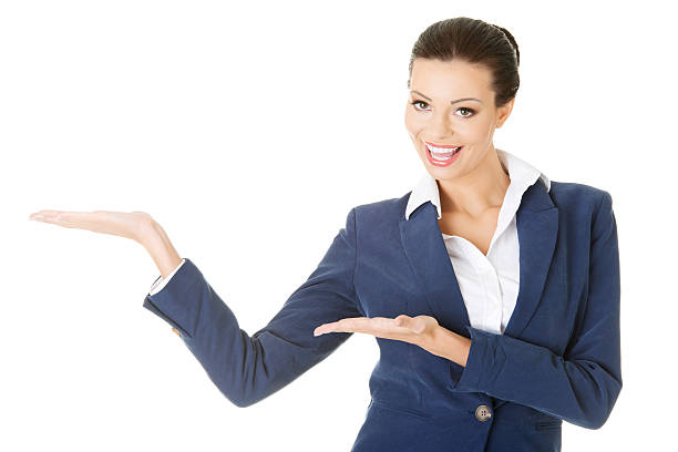 istock Attractive business woman pointing on copy space. 188138291
