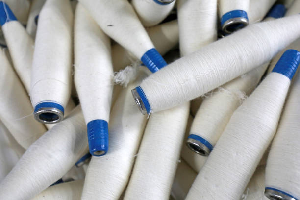 istock Cotton yarn is piled up in a spinning mill 1881414464