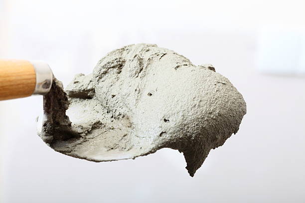 istock Close up bucket trowel with cement mortar 188141684
