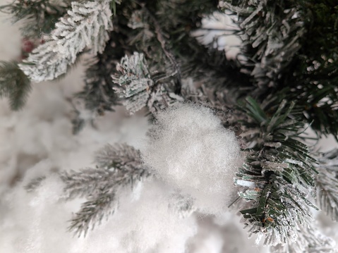 Focus scene on white Christmas tree