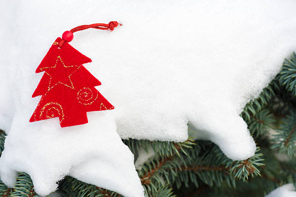 istock christmas tree toy in snow 188145827
