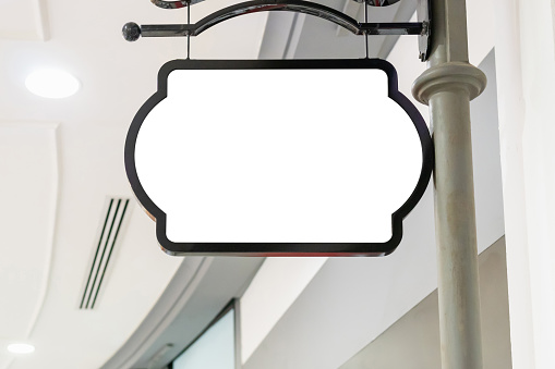 Mockup image of Blank billboard white screen posters outside shop for advertising