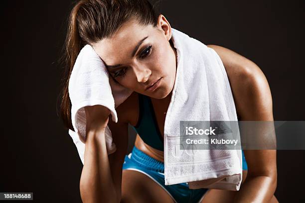 Tired Woman Resting After Workout Stock Photo - Download Image Now - Adult, Adults Only, Athlete
