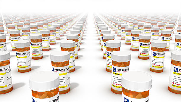 Front high angle view of Pill Bottles Endless Pill Bottles food and drug administration photos stock pictures, royalty-free photos & images