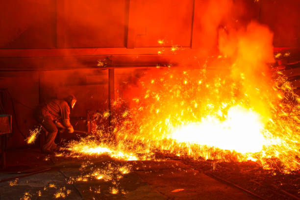 istock iron works blast furnace taphole spewing molten iron 1881535546