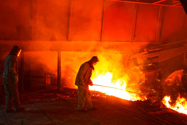 istock iron works blast furnace taphole spewing molten iron 1881535547