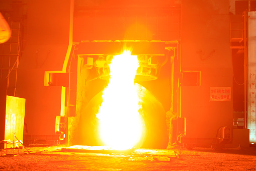 steel mills converter flame, closeup of photo