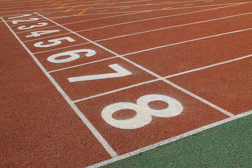 red plastic runway in a sports ground in a middle school