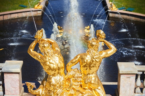 Paris, France - September 30, 2021: Golden statue on the Pont Alexandre III bridge on the Seine in Paris.