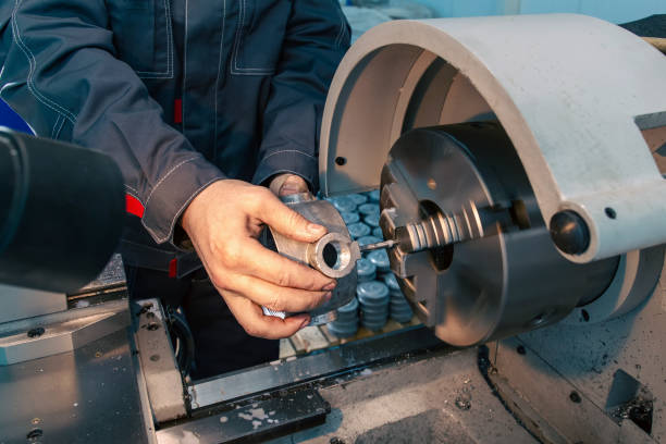 istock A worker works on a lathe at a machine-building plant. 1881552215