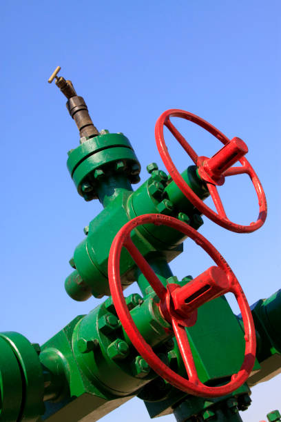 istock green petroleum machinery and red handwheel 1881555928