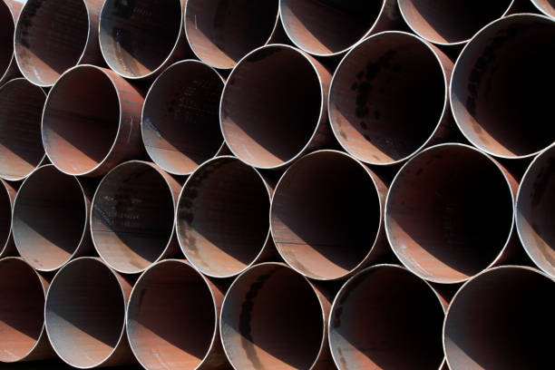 istock Piles of steel pipe 1881589825