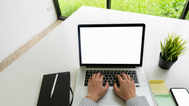 istock Hand using laptop computer and internet Type on the keyboard to search for information. Freelance copywriter, online shopping, typing text, close-up images. 1881607715