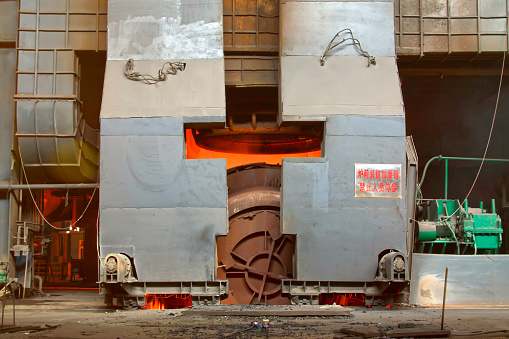 TANGSHAN - JUNE 18: converter gradually open the oven door in a iron and steel co., on June 18, 2014, Tangshan city, Hebei Province, China