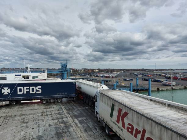 trelleborg, sweden - april 04 2023 : trucks and trailers are waiting in the harbor on ferry and quay - harbor editorial industrial ship container ship imagens e fotografias de stock