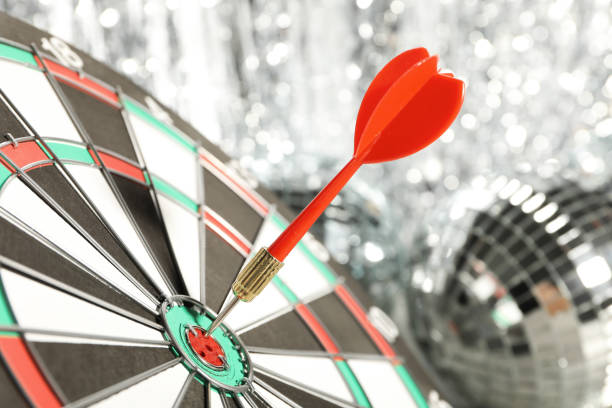 istock Darts hitting the target game at the party. 1881776009