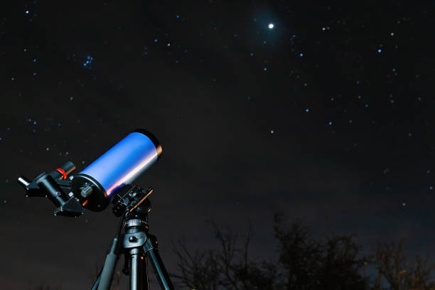istock An astronomical telescope on a tripod is ready for stargazing at night 1881798634