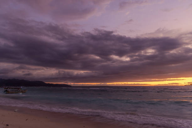 istock Sunset on the beach with clouds, Gili Meno, Indonesia 1881806811
