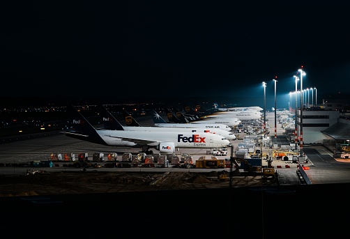Cologne, Germany – December 03, 2023: A row of commercial airliners parked at the Cologne airport