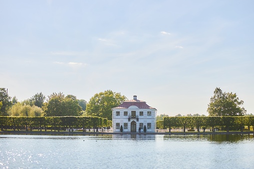 Vienna, WIEN, Austria - August 22, 2023: Belvedere Castle and little lake and flowers