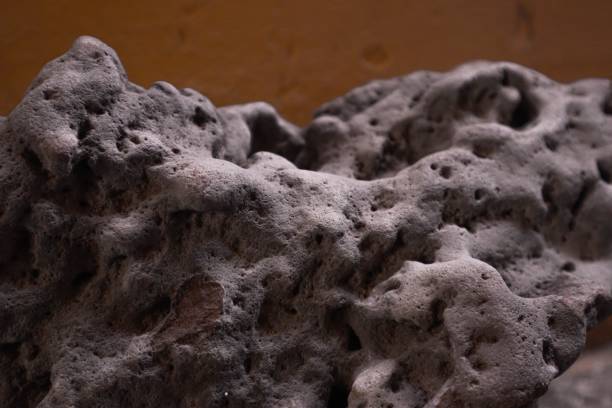 istock Textured rock with holes 1881894467