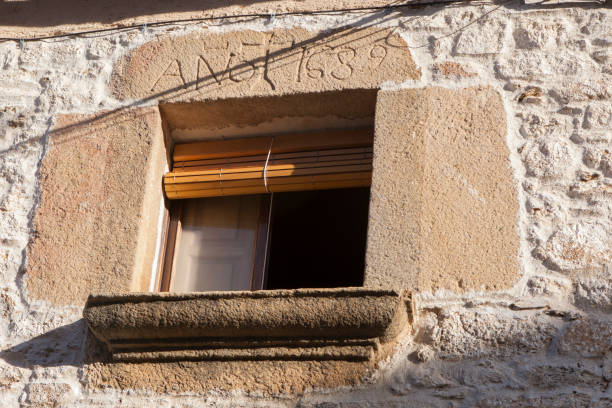 istock Window with lintel and carved granite sill 1881948413