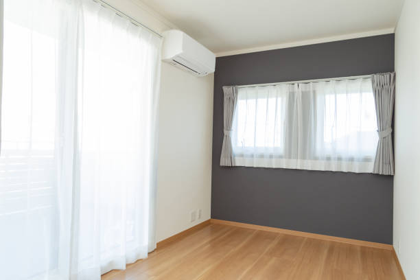 Room with gray wallpaper.