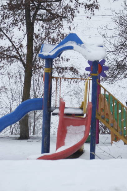 istock winter landscape and children's park 1882015806