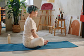 Girl Meditating in Lotus Position