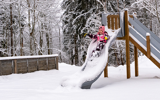 A child in the yard of an urban area in Finland