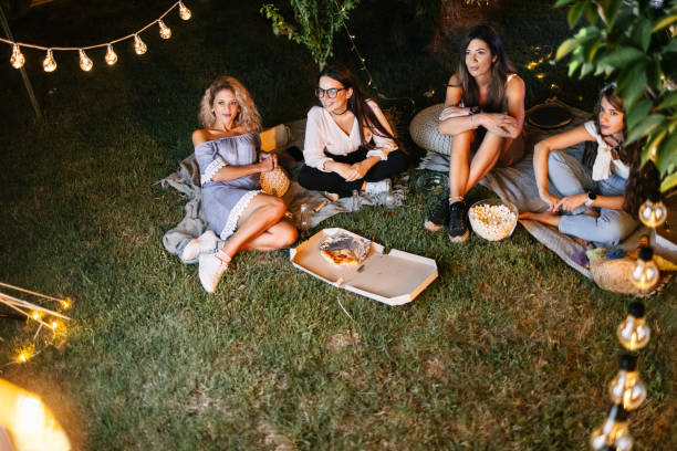 istock Watching a movie outdoor 1882108074