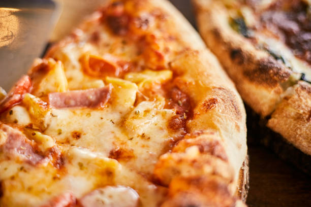 istock Slice of hot pizza large cheese lunch or dinner crust 1882112693