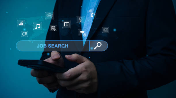 istock Job Search Technology Search Engine Optimization (SEO). Man are using a smartphone to Searching for job information. Using Search Console with your website. 1882154223