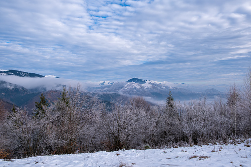 Beautiful winter view over rolling mountains. Transilvania, Romania