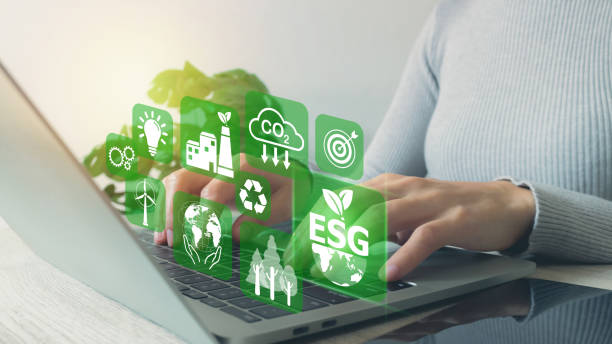 istock Women use a laptop computer to analyze ESG. plan to renewable resources to reduce pollution and carbon emission ,environment social governance investment Net zero concept. 1882154232