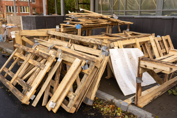 istock Disassembled Wooden Crate with Stacked Planks on Construction Site 1882199336