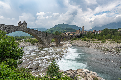 A view of Bobbio and its famous landmark, the Old Bride, Emilia-Romagna, Italy.
