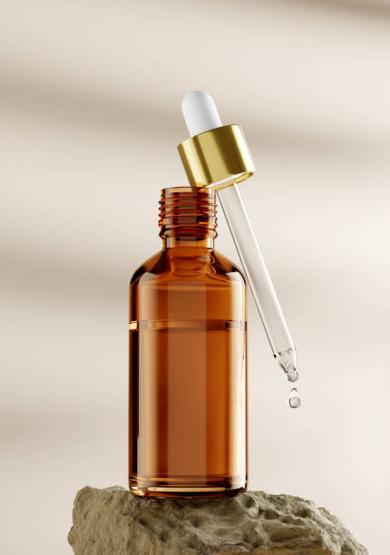 istock Serum Dropper Bottle Mockup on a rock - 3D Illustration 1882254999