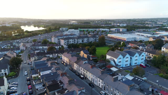 Slow moving drone shot during sunset over Galway, Ireland.