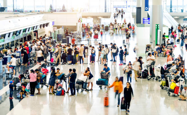 istock Crowd of people waiting for check-in 1882314403