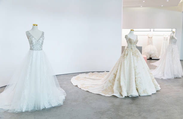 istock Beautiful wedding dresses in the store 1882319687