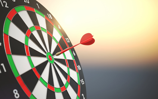 3d Render Dartboard Red and Green Selected Color and Arrow, hit the target from 12 Sunset, Concept to achieve success and target (Depth Of Field)